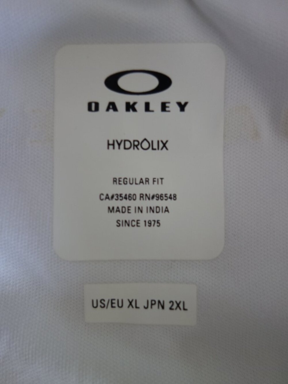 NWT $50 OAKLEY White Polo Hydrolix Shirt w/ Blue Green Stripes – Mens XL - Picture 2 of 7